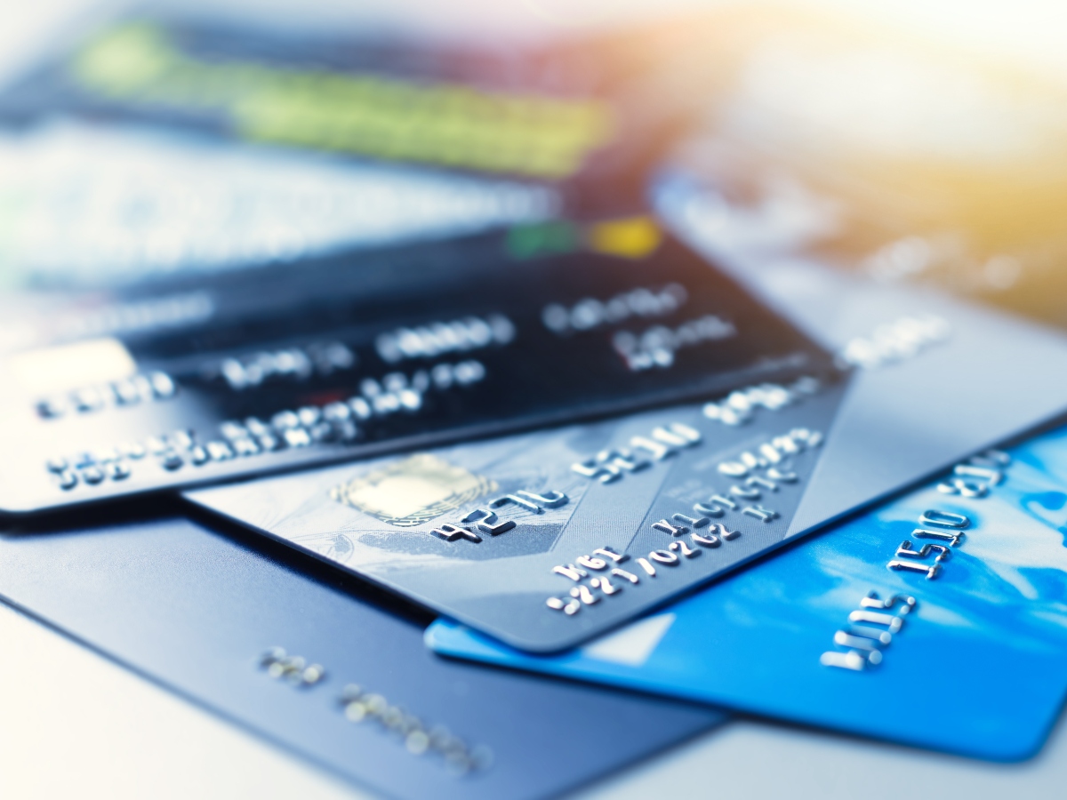 Close-up of a lot of credit and debit plastic bank cards.